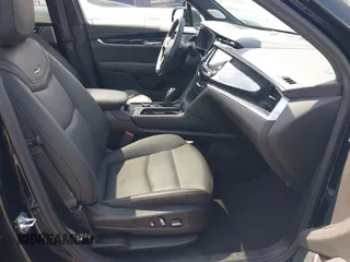 2025 Cadillac XT6 AWD Premium Luxury with VIN 1GYKPDRS3SZ118214, listed as a IAAI auction lot 42100315 with 12,795 mi miles and . Bid and sale history available at DreamBid. Image 5.