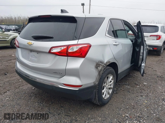 2018 Chevrolet Equinox LT with VIN 2GNAXSEV0J6118016, listed as a IAAI auction lot 42010356 with 95,254 mi miles and . Bid and sale history available at DreamBid. Image 4.
