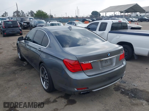 2012 BMW 7 Series 740i with VIN WBAKA4C52CC613676, listed as a IAAI auction lot 42509312 with 113,971 mi miles and . Bid and sale history available at DreamBid. Image 3.