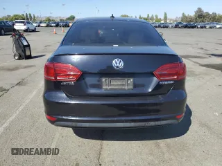 2014 Volkswagen Jetta Hybrid SE z VIN 3VW637AJ7EM296699, wystawiony jako Copart lot #61054715 z przebiegiem 147 308 mil mil oraz Czysty tytuł • Clean title. Historia ofert i sprzedaży dostępna na DreamBid. Obrazek 6.
