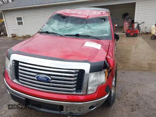 2012 Ford F-150 XL with VIN 1FTFW1ET1CFA18994, listed as a IAAI auction lot 41911367 with 212,883 mi miles. Bid and sale history available at carsss.com. Image 6.