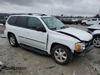 2004 GMC Envoy SLT with VIN 1GKDT13SX42404837, listed as a Copart auction lot 84515994 with 184,153 mi miles and Salvage Title. Bid and sale history available at carsss.com. Image 4.