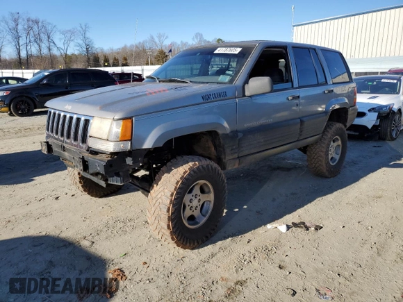 1998 Jeep Grand Cherokee Laredo with VIN 1J4GZ58S5WC295461, listed as a Copart auction lot 41787605 with 185,801 mi miles and Salvage Title. Bid and sale history available at carsss.com. Image 1.