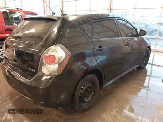 2010 Pontiac Vibe w/1SB with VIN 5Y2SP6E02AZ410781, listed as a IAAI auction lot 40984876 with 235,317 mi miles. Bid and sale history available at carsss.com. Image 4.