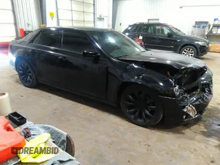 2014 Chrysler 300 S with VIN 2C3CCABG2EH343503, listed as a IAAI auction lot 40934463 with 128,876 mi miles and . Bid and sale history available at carsss.com. Image 1.