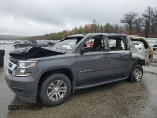 2018 Chevrolet Suburban LT z VIN 1GNSKHKC9JR262273, wystawiony jako Copart lot #51970175 z przebiegiem Nie podano mil oraz Szkoda całkowita • Salvage title. Historia ofert i sprzedaży dostępna na DreamBid. Obrazek 1.