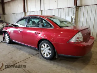 2009 Ford Taurus SE with VIN 1FAHP23W09G125424, listed as a Copart auction lot 65439654 with 138,441 mi miles and Salvage Title. Bid and sale history available at carsss.com. Image 2.