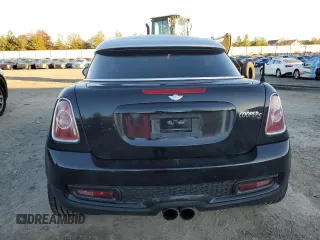 2013 MINI Coupe S z VIN WMWSX3C53DT466665, wystawiony jako Copart lot #79497824 z przebiegiem 94 767 mil mil oraz Szkody całkowita. Historia ofert i sprzedaży dostępna na DreamBid. Obrazek 6.