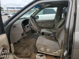 2002 Nissan Pathfinder SE с VIN JN8DR09Y02W730169, выставлен на аукционе Copart как лот 55137825 с пробегом 212 076 миль миль и Списание • Salvage title. История ставок и продаж доступна на DreamBid. Изображение 7.