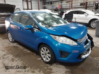 2013 Ford Fiesta SE z VIN 3FADP4BJ7DM225471, wystawiony jako IAAI lot #41625556 z przebiegiem 70 948 mil mil oraz . Historia ofert i sprzedaży dostępna na DreamBid. Obrazek 1.