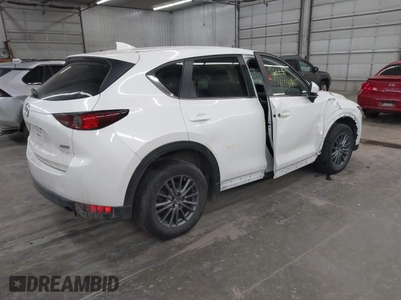 2017 Mazda CX-5 Touring with VIN JM3KFBCL9H0107589, listed as a IAAI auction lot 41241481 with 77,032 mi miles. Bid and sale history available at carsss.com. Image 4.