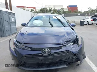 2023 Toyota Corolla LE with VIN JTDB4MEE5PJ006860, listed as a IAAI auction lot 41787964 with 18,883 mi miles. Bid and sale history available at carsss.com. Image 12.