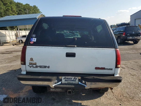 1995 GMC Yukon with VIN 1GKEK18K2SJ700616, listed as a Copart auction lot 68582034 with 205,980 mi miles and Salvage Title. Bid and sale history available at carsss.com. Image 6.
