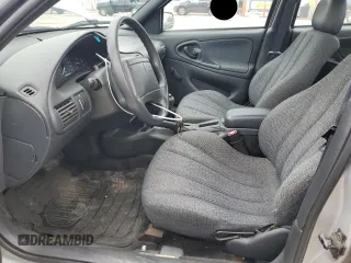 2000 Chevrolet Cavalier z VIN 1G1JC524XY7167485, wystawiony jako Copart lot #55875645 z przebiegiem 63 294 mil mil oraz Tytuł czysty. Historia ofert i sprzedaży dostępna na DreamBid. Obrazek 7.