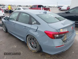 2022 Honda Civic Sedan Sport with VIN 2HGFE2F59NH559013, listed as a IAAI auction lot 41065208 with 39,803 mi miles. Bid and sale history available at carsss.com. Image 3.