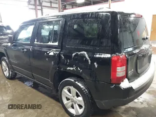 2014 Jeep Patriot Limited with VIN 1C4NJRCB8ED910340, listed as a IAAI auction lot 41396065 with 241,669 mi miles. Bid and sale history available at carsss.com. Image 3.