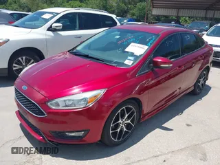 2016 Ford Focus SE z VIN 1FADP3F28GL237888, wystawiony jako IAAI lot #42564140 z przebiegiem 143 210 mil mil oraz . Historia ofert i sprzedaży dostępna na DreamBid. Obrazek 2.