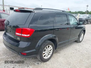 2017 Dodge Journey SXT z VIN 3C4PDCBG1HT531835, wystawiony jako IAAI lot #42867564 z przebiegiem 197 073 mil mil oraz . Historia ofert i sprzedaży dostępna na DreamBid. Obrazek 4.