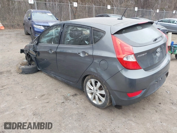 2013 Hyundai Accent SE with VIN KMHCU5AE1DU091931, listed as a IAAI auction lot 41783034 with 72,732 mi miles. Bid and sale history available at carsss.com. Image 3.