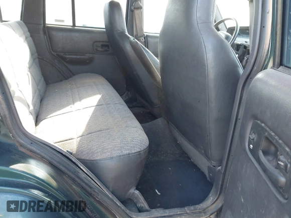 1999 Jeep Cherokee Sport with VIN 1J4FT68S6XL579735, listed as a IAAI auction lot 41484413 with 146,862 mi miles and . Bid and sale history available at DreamBid. Image 8.