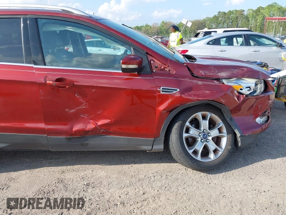 2014 Ford Escape Titanium with VIN 1FMCU0JX7EUB96463, listed as a IAAI auction lot 41935190 with 67,098 mi miles. Bid and sale history available at carsss.com. Image 6.