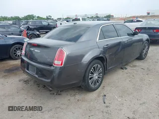 2014 Chrysler 300 S with VIN 2C3CCAGG5EH201509, listed as a IAAI auction lot 42292680 with 162,674 mi miles and . Bid and sale history available at DreamBid. Image 4.