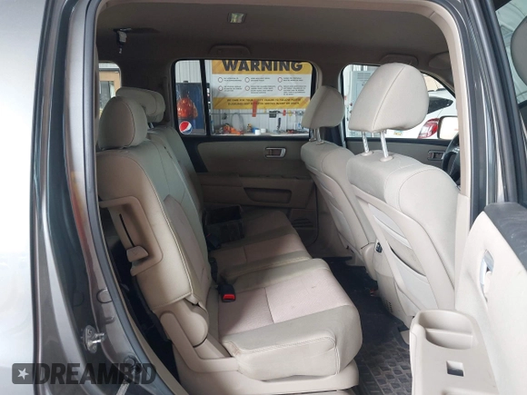 2009 Honda Pilot EX with VIN 5FNYF48419B021891, listed as a IAAI auction lot 42241327 with 178,926 mi miles and . Bid and sale history available at DreamBid. Image 8.