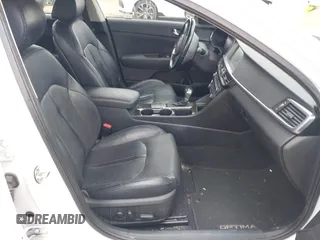2016 Kia Optima EX with VIN 5XXGU4L31GG086203, listed as a IAAI auction lot 42128099 with 157,988 mi miles. Bid and sale history available at carsss.com. Image 5.