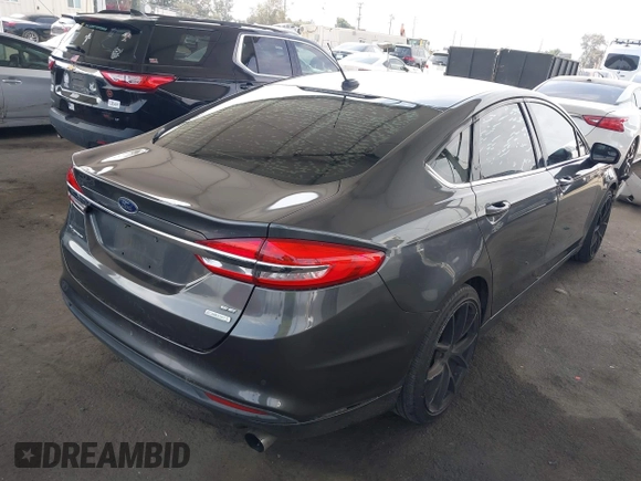 2017 Ford Fusion SE with VIN 3FA6P0HDXHR242034, listed as a IAAI auction lot 42356463 with 65,584 mi miles and . Bid and sale history available at DreamBid. Image 4.