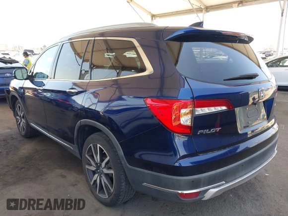 2019 Honda Pilot Touring 8-Passenger z VIN 5FNYF5H97KB013530, wystawiony jako IAAI lot #42403449 z przebiegiem 90 557 mil mil oraz . Historia ofert i sprzedaży dostępna na DreamBid. Obrazek 3.