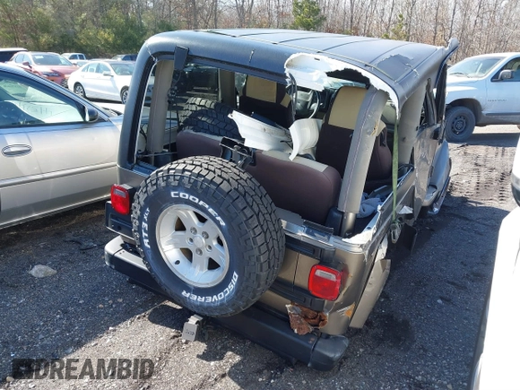 2004 Jeep Wrangler Sahara with VIN 1J4FA59S14P772264, listed as a IAAI auction lot 41814074 with 165,750 mi miles and . Bid and sale history available at DreamBid. Image 4.