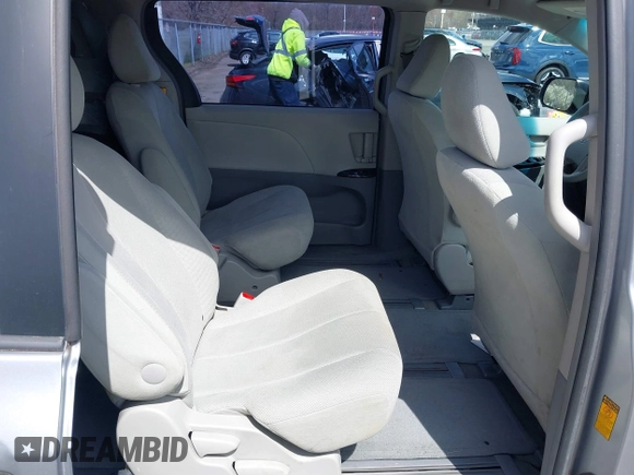 2013 Toyota Sienna L with VIN 5TDZK3DC9DS298333, listed as a IAAI auction lot 41941011 with 141,021 mi miles. Bid and sale history available at carsss.com. Image 8.