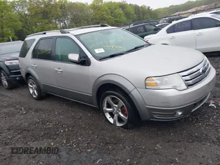 2008 Ford Taurus X SEL z VIN 1FMDK05W48GA37513, wystawiony jako IAAI lot #42194501 z przebiegiem Nie podano mil oraz . Historia ofert i sprzedaży dostępna na DreamBid. Obrazek 1.