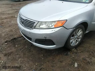 2010 Kia Optima LX with VIN KNAGG4A8XA5414877, listed as a IAAI auction lot 41929987 with 138,279 mi miles. Bid and sale history available at carsss.com. Image 6.