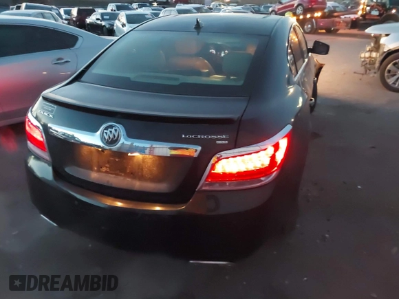 2011 Buick LaCrosse CXS with VIN 1G4GE5GD1BF158297, listed as a IAAI auction lot 41271158 with 104,659 mi miles and . Bid and sale history available at DreamBid. Image 4.