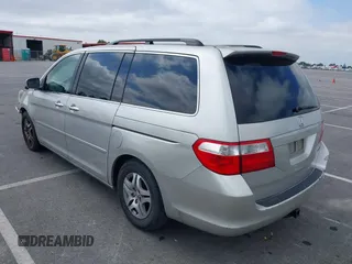 2005 Honda Odyssey EX-L with VIN 5FNRL38745B075486, listed as a IAAI auction lot 42080772 with 197,158 mi miles and . Bid and sale history available at DreamBid. Image 3.