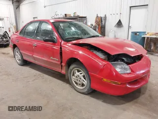 1999 Pontiac Sunfire SE z VIN 1G2JB524XX7547651, wystawiony jako IAAI lot #41962158 z przebiegiem 130 385 mil mil oraz . Historia ofert i sprzedaży dostępna na DreamBid. Obrazek 1.