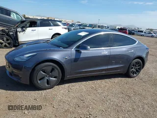 2020 Tesla Model 3 Standard Range Plus with VIN 5YJ3E1EA5LF644282, listed as a IAAI auction lot 41710124 with 69,969 mi miles and . Bid and sale history available at DreamBid. Image 13.