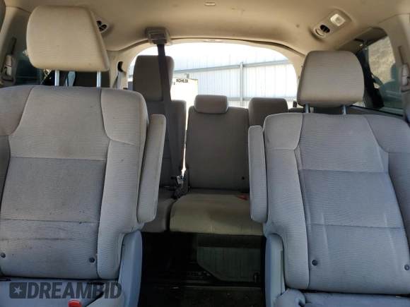 2012 Honda Odyssey LX z VIN 5FNRL5H2XCB147224, wystawiony jako Copart lot #59165425 z przebiegiem 214 730 mil mil oraz Szkoda całkowita • Salvage title. Historia ofert i sprzedaży dostępna na DreamBid. Obrazek 10.