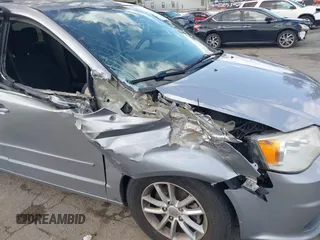 2016 Dodge Grand Caravan SXT with VIN 2C4RDGCG9GR180396, listed as a IAAI auction lot 41921312 with 130,256 mi miles and . Bid and sale history available at DreamBid. Image 6.