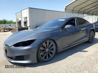 2016 Tesla Model S 90D with VIN 5YJSA1E22GF177120, listed as a Copart auction lot 51972885 with 73,441 mi miles and Salvage title. Bid and sale history available at DreamBid. Image 1.