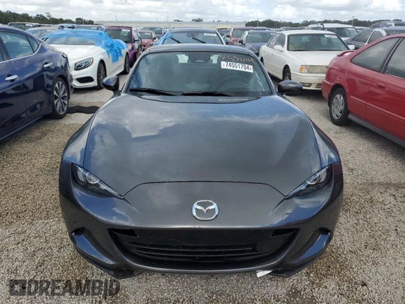 2024 Mazda MX-5 Miata Grand Touring z VIN JM1NDAM73R0603254, wystawiony jako Copart lot #74551704 z przebiegiem Nie podano mil oraz Nie do naprawy • Non repairable. Historia ofert i sprzedaży dostępna na DreamBid. Obrazek 5.