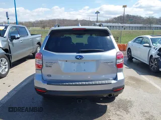 2016 Subaru Forester 2.5i Touring with VIN JF2SJAVC8GH493549, listed as a IAAI auction lot 41875775 with 74,767 mi miles. Bid and sale history available at carsss.com. Image 17.