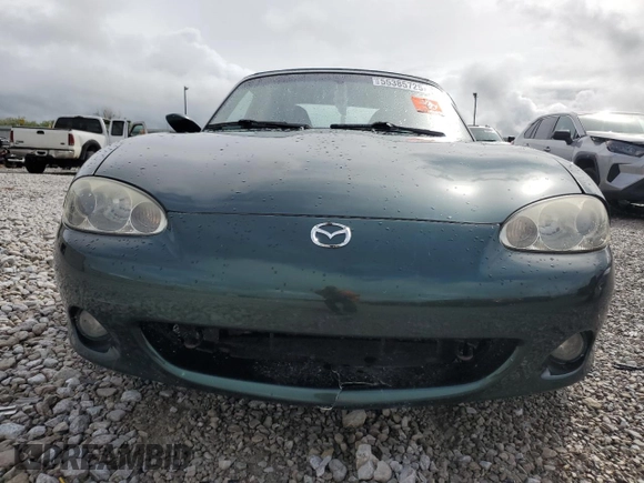 2001 Mazda MX-5 Miata z VIN JM1NB353610200693, wystawiony jako Copart lot #55385725 z przebiegiem 98 777 mil mil oraz Szkoda całkowita • Salvage title. Historia ofert i sprzedaży dostępna na DreamBid. Obrazek 5.