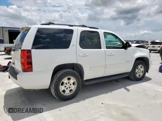 2014 Chevrolet Tahoe LT with VIN 1GNSCBE07ER239575, listed as a Copart auction lot 63094525 with 142,467 mi miles and Salvage title. Bid and sale history available at DreamBid. Image 3.