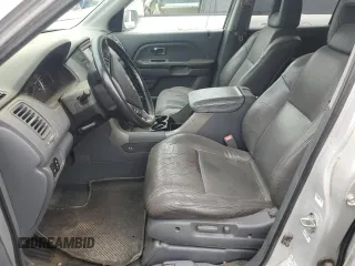 2003 Honda Pilot EX z VIN 2HKYF18763H581343, wystawiony jako Copart lot #60804525 z przebiegiem 236 636 mil mil oraz Szkoda całkowita • Salvage title. Historia ofert i sprzedaży dostępna na DreamBid. Obrazek 7.