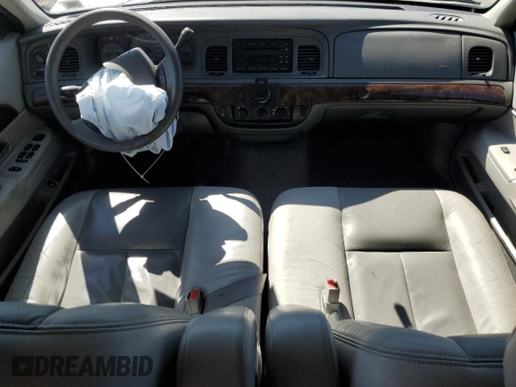2005 Mercury Grand Marquis GS with VIN 2MEFM74W55X654070, listed as a Copart auction lot 53114785 with 56,128 mi miles and Salvage Title. Bid and sale history available at DreamBid. Image 8.