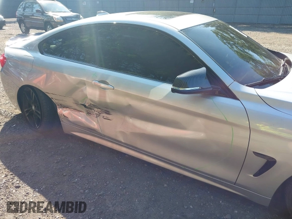 2015 BMW 4 Series 435i xDrive z VIN WBA3R5C51FK372061, wystawiony jako IAAI lot #42546096 z przebiegiem 163 692 mil mil oraz . Historia ofert i sprzedaży dostępna na DreamBid. Obrazek 6.
