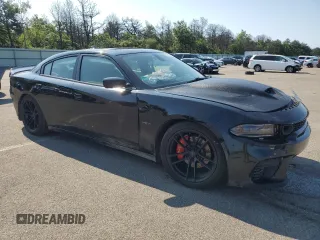 2016 Dodge Charger R/T with VIN 2C3CDXCT1GH204252, listed as a Copart auction lot 61090155 with 153,395 mi miles and Salvage title. Bid and sale history available at DreamBid. Image 4.
