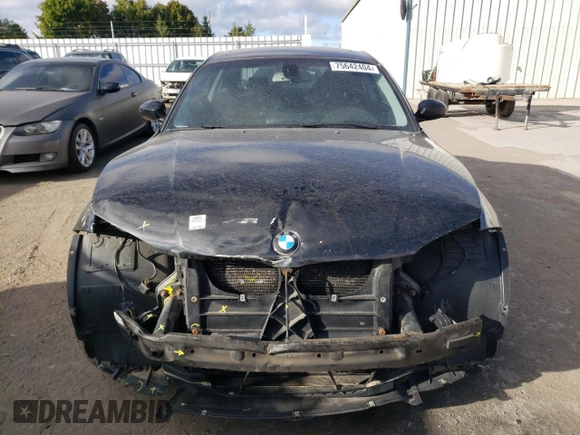 2009 BMW 1 Series 128i with VIN WBAUP73529VK75976, listed as a Copart auction lot 75642404 with 131,653 mi miles and Salvage Title. Bid and sale history available at carsss.com. Image 5.